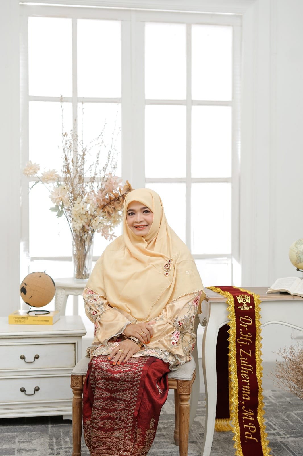 Dr. Hj. Zulherma,. M.Pd